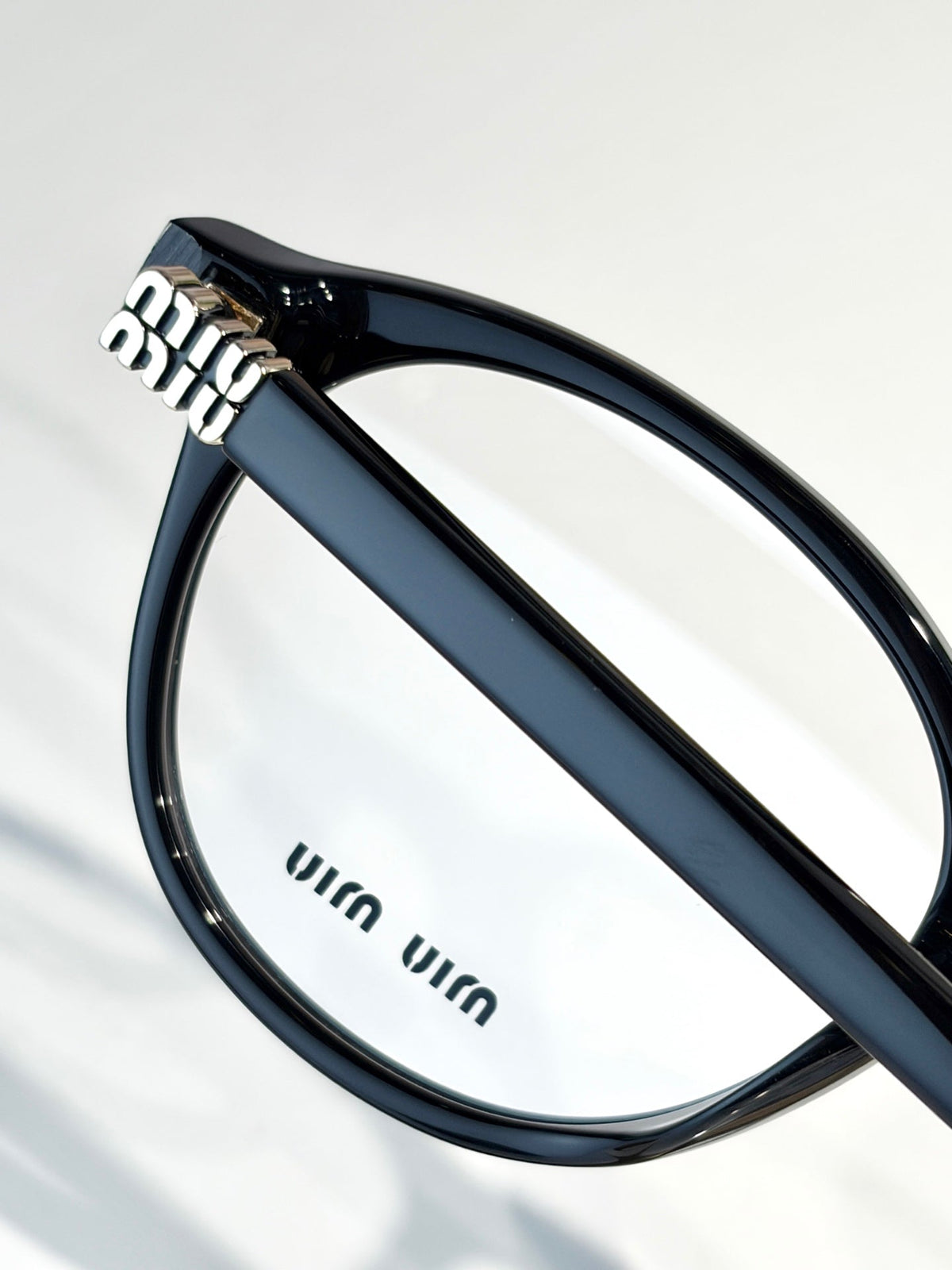 Miu Miu VMU 02WVF Sunglasses product image 6, provided for visual reference and product detail review