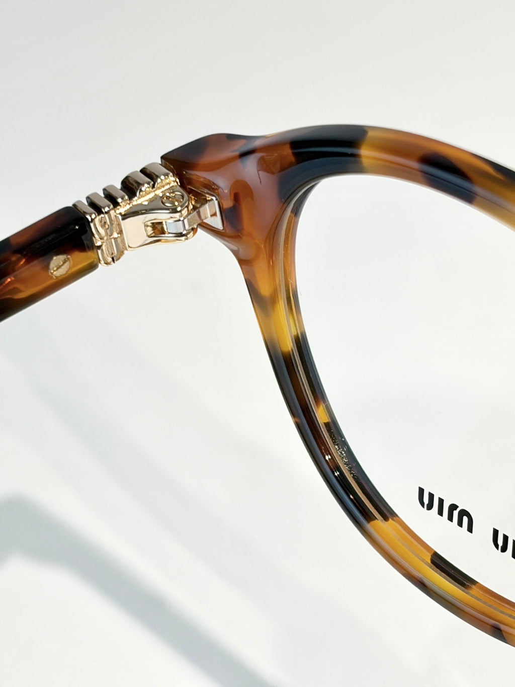 Miu Miu VMU 02WVF Sunglasses product image 8, provided for visual reference and product detail review