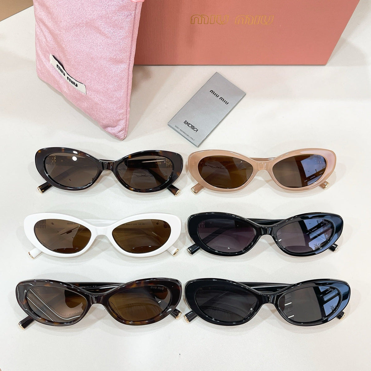 Miu Miu VMU 85S Sunglasses product image 8, provided for visual reference and product detail review
