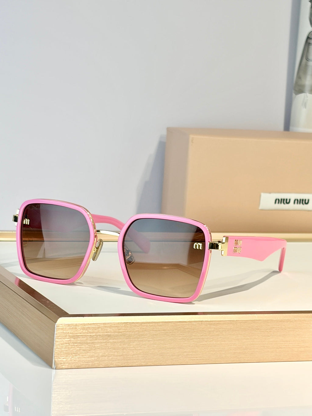 Miu Miu MU B19 Sunglasses product image 2, provided for visual reference and product detail review