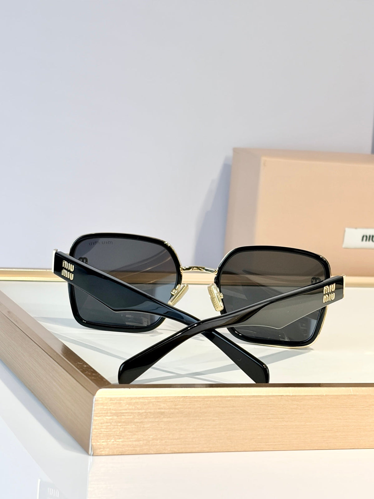 Miu Miu MU B19 Sunglasses product image 9, provided for visual reference and product detail review