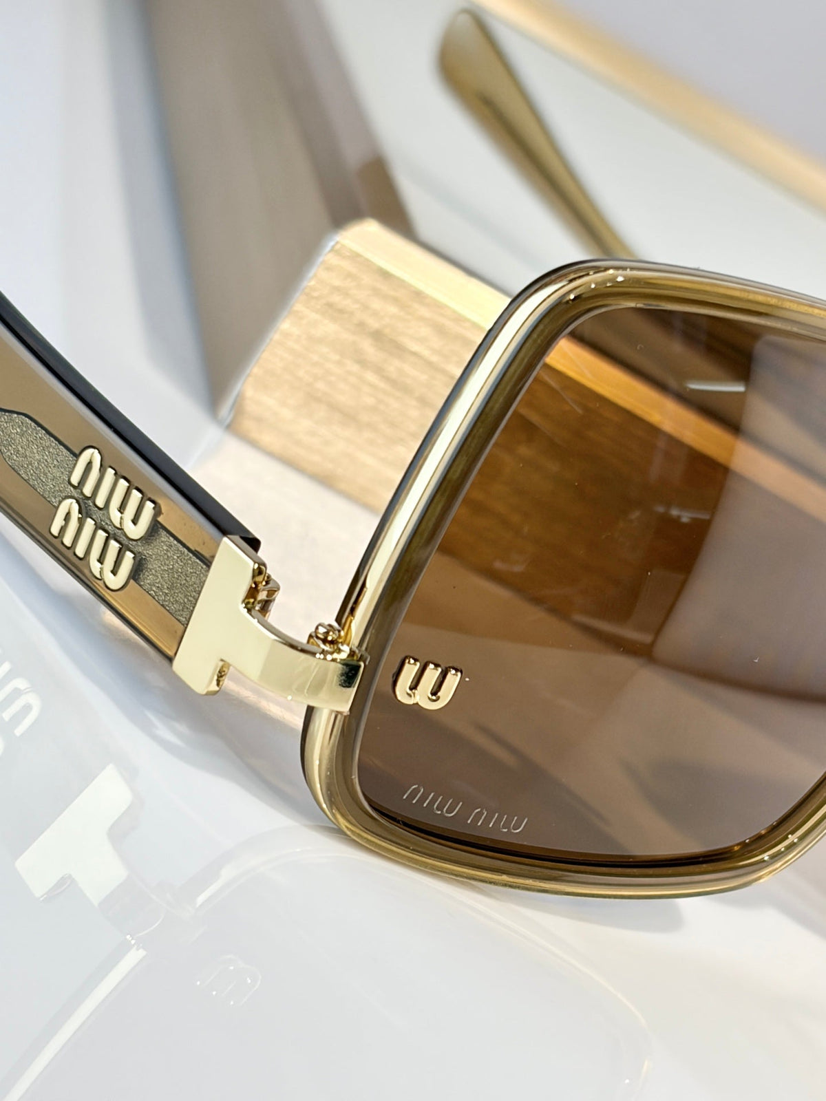 Miu Miu MU B19 Sunglasses product image 15, provided for visual reference and product detail review