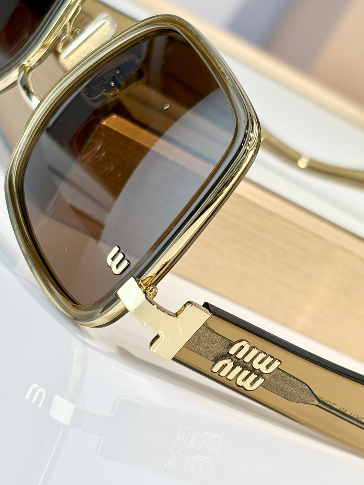 Miu Miu MU B19 Sunglasses product image 16, provided for visual reference and product detail review