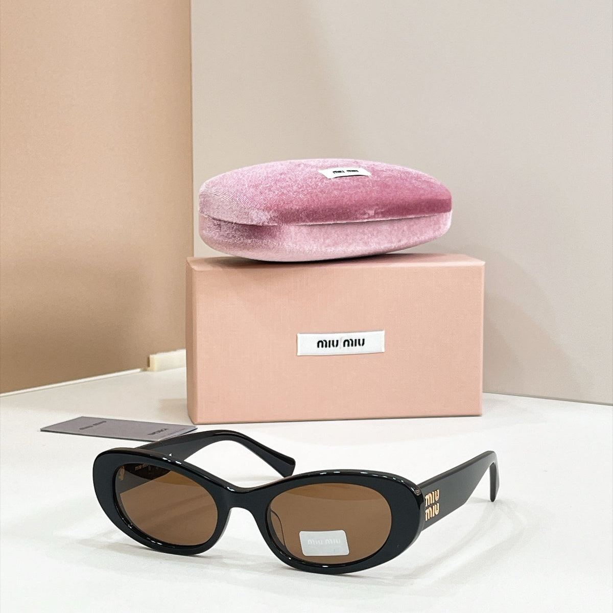 Miu Miu MU C02S Sunglasses product image 1, provided for visual reference and product detail review